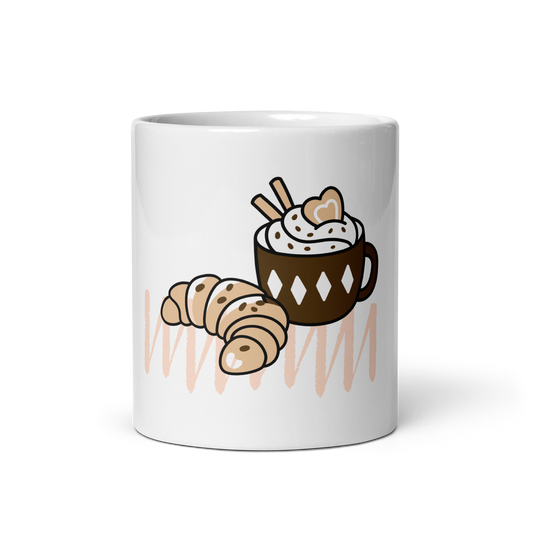 A white ceramic mug featuring a cute cartoon illustration of a chocolate coffee cup with whipped cream and a croissant, set against a clean white background.