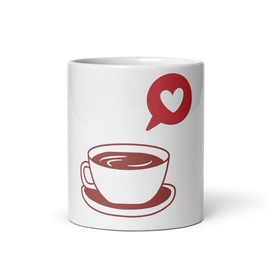 A white ceramic mug featuring a minimalist red graphic of a coffee cup on a saucer with a speech bubble heart above it, set against a clean white background.
